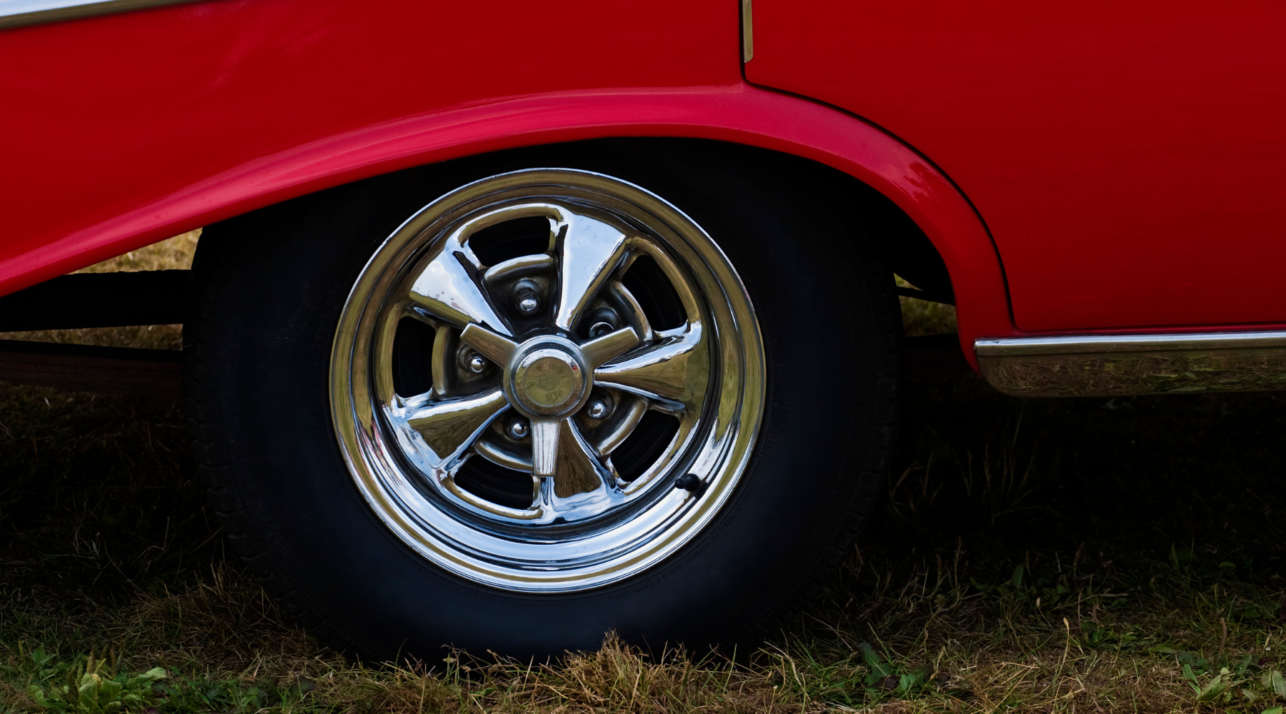 luxury car with shiny chrome rims
