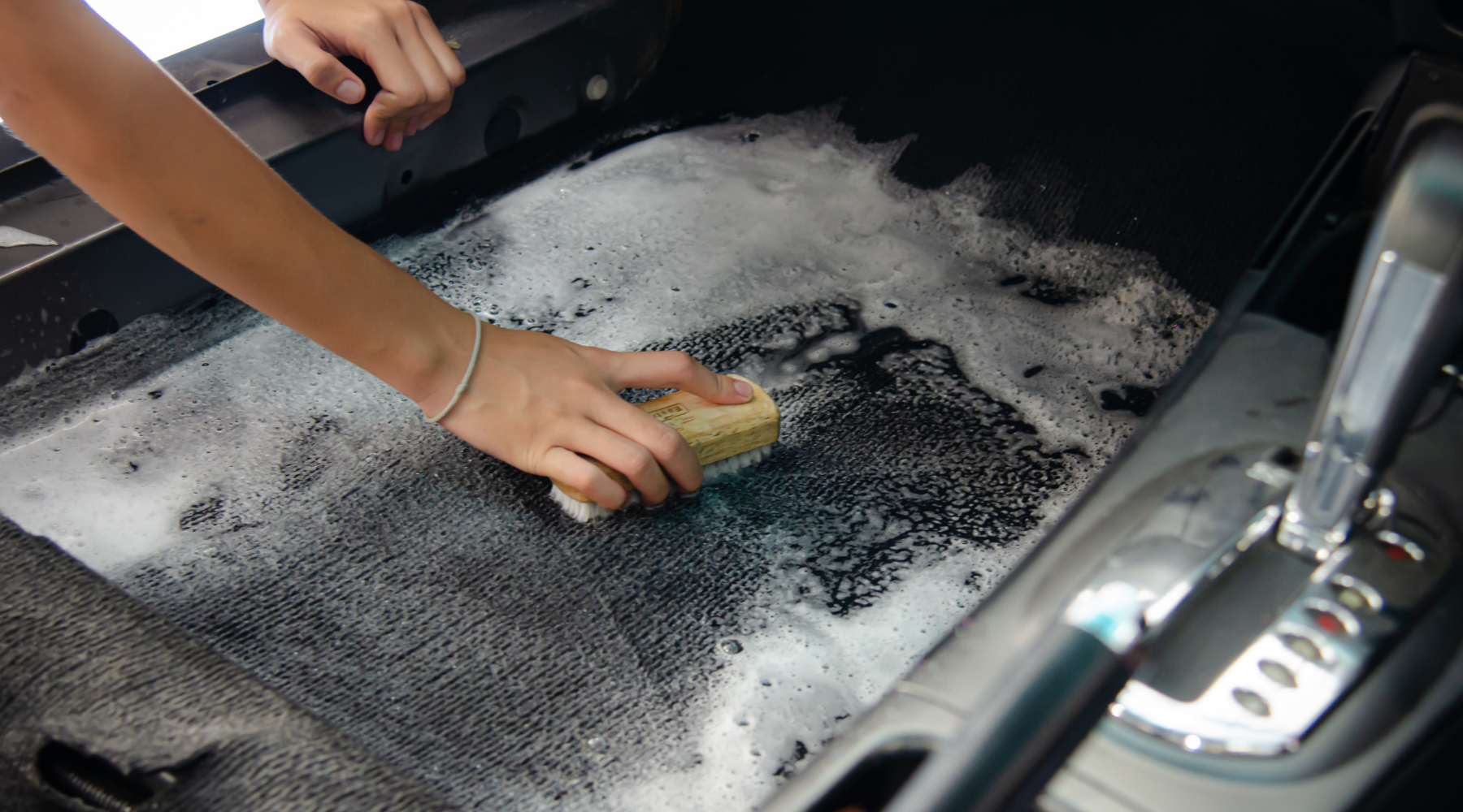 cleaning car carpet by hand
