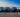 Four new vehicles lined up on a lot