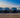 Four new vehicles lined up on a lot
