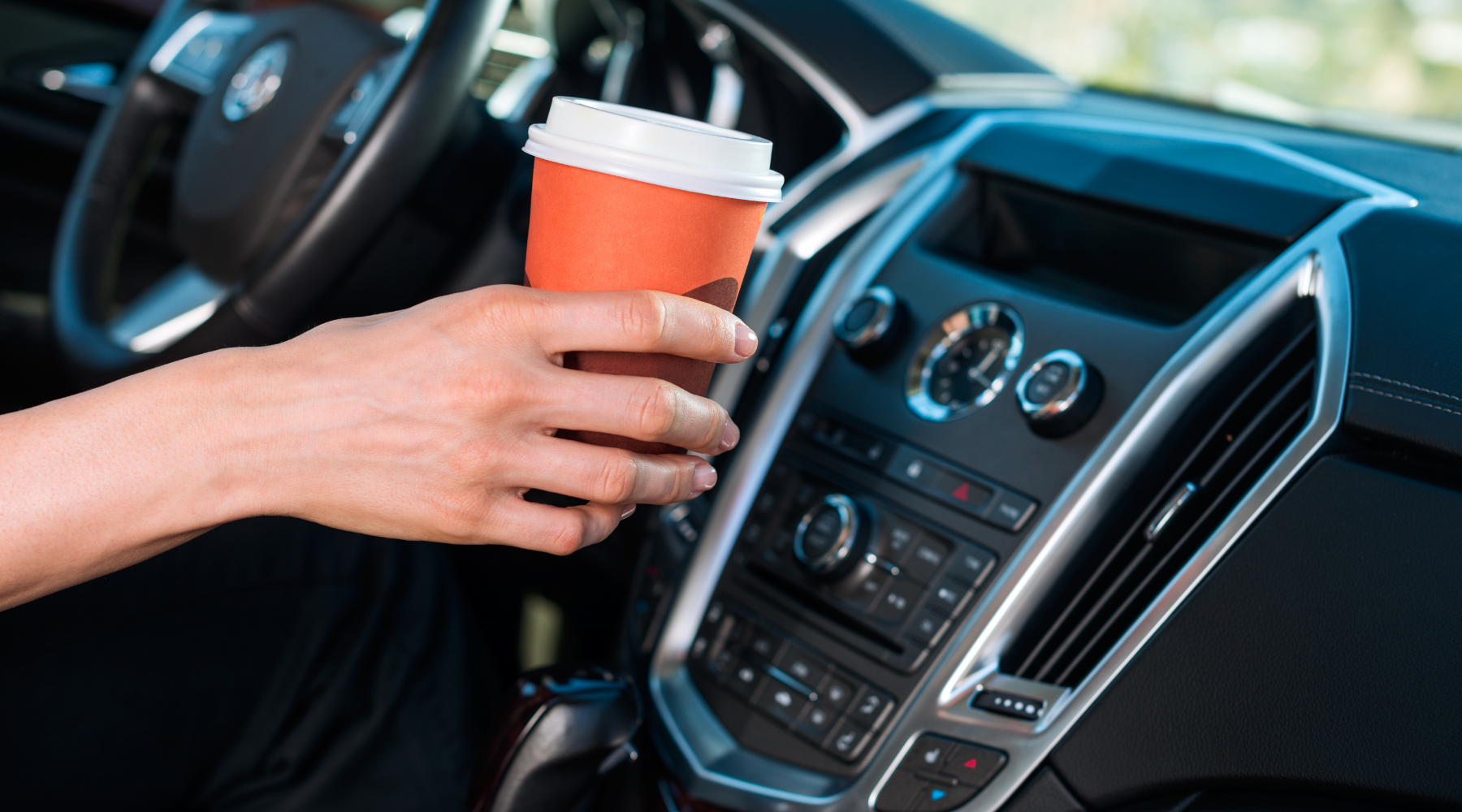 driver spilling coffee from cup