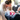 parents strapping child into a clean car seat